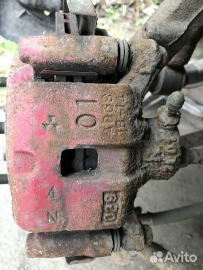 Суппорт задний правый Mitsubishi Galant 8 2.4i