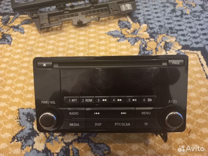 Штатная магнитола с рамкой на Mitsubishi Lancer X