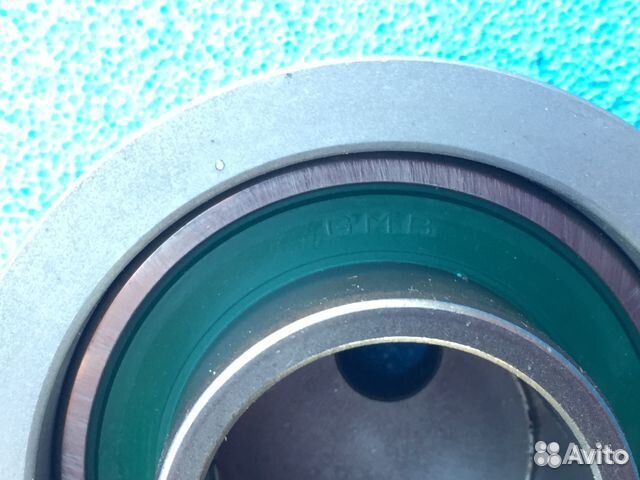 Hyundai Tucson 2004-2010г ролик-натяжитель ремня