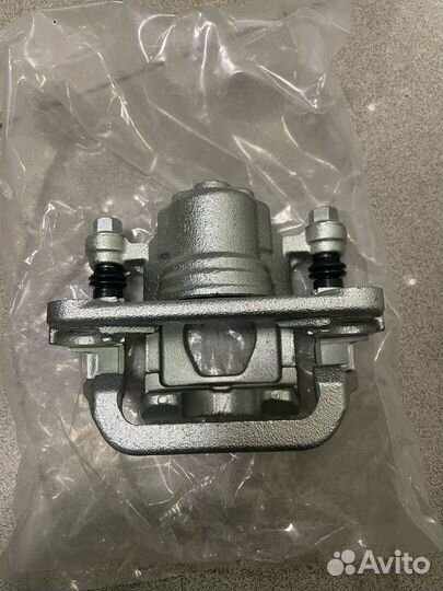 Суппорт тормозной nissan juke /qashqai зад лев