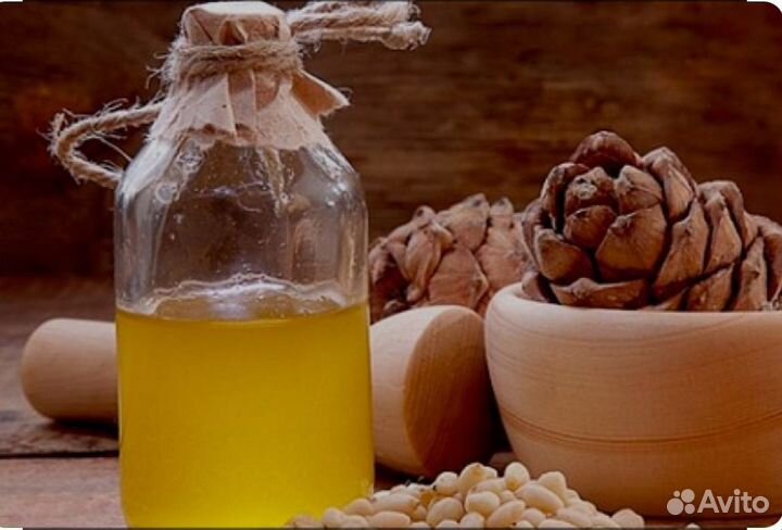 Сыродавленное масло кедрового ореха из бочонка