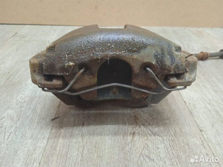 Суппорт передний левый Mazda 3 BL 2010