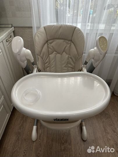 Детский стульчик-качели для кормления