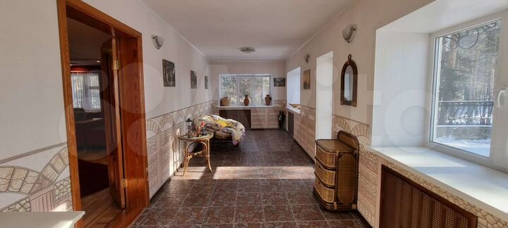 Коттедж 415 м² на участке 12 сот.