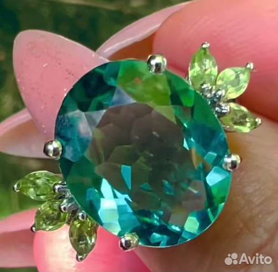 Аквамарин в серебояном кольце