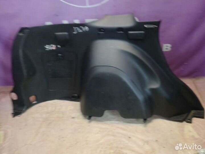 Обшивка багажника левая Mitsubishi Outlander Xl