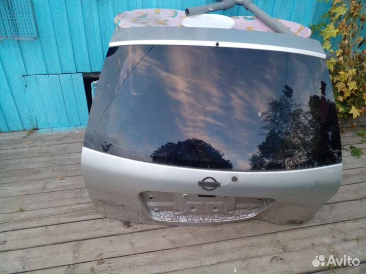 Крышка багажника nissan tino