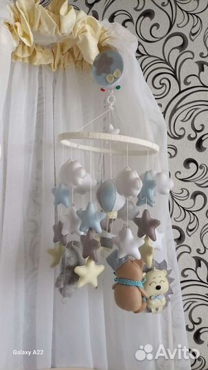 Музыкальный мобиль на кроватку