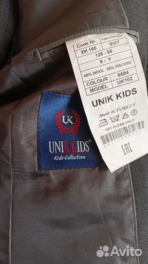 Школьный костюм для мальчика 128 серый