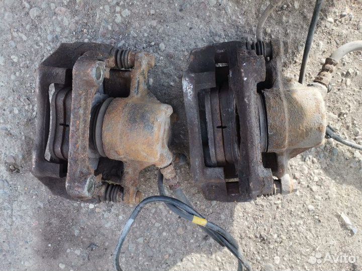 Суппорт тормозной передний Mercedes W201 седан 2.3