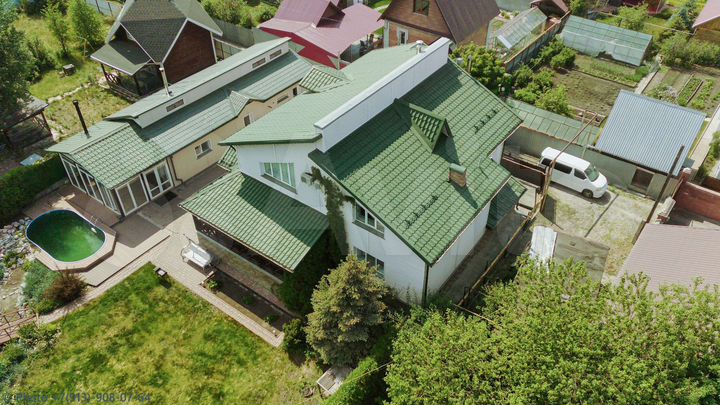 Коттедж 353 м² на участке 10 сот.