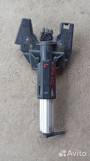 Форсунка омывателя фар левая Пежо 308