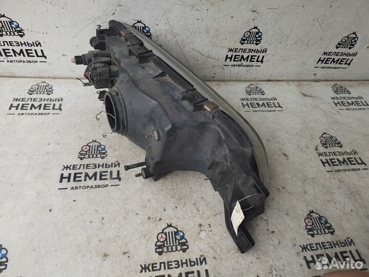Фара левая Nissan Almera N15 до рест