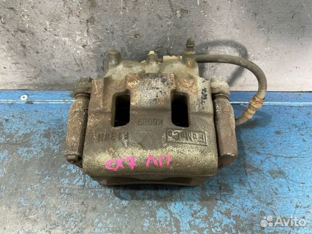 Суппорт передний левый Mazda Cx-7 ER