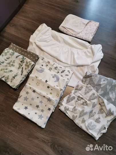 Простынь на резинке и пелёнки