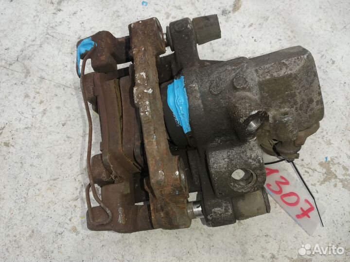 Суппорт тормозной задний левый Mazda 3 (BK) I рест