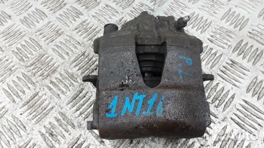 Суппорт тормозной передний левый skoda octavia A7