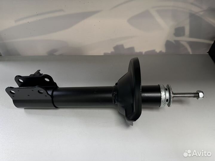 Амортизатор задний левый масляный mazda 323