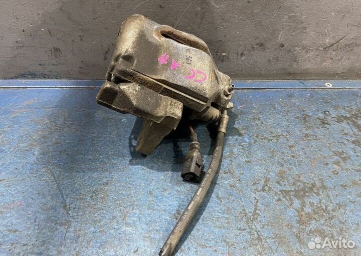 Суппорт передний левый Volkswagen Passat B6