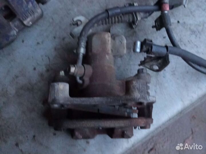 Суппорт задний левый и правый Mazda 6 GH