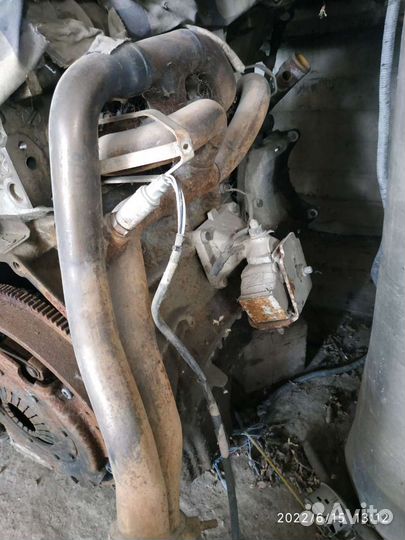 Коллектор выпускной саненг Муссо