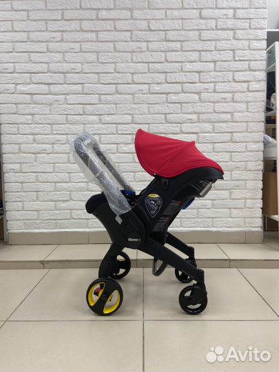 Коляска-автокресло Doona flame red