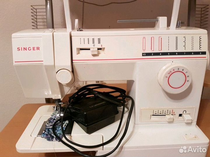 Электрическая швейная машинка Singer