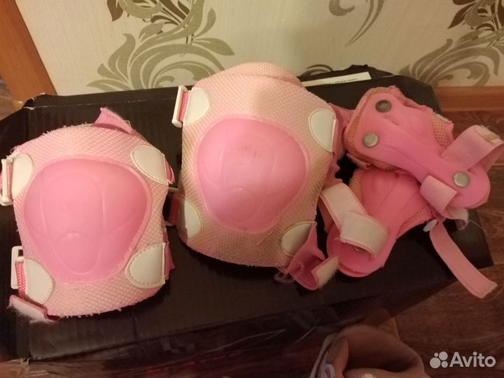 Роликовые коньки