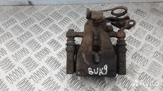 Суппорт тормозной задний правый ford kuga 1 (BUK09