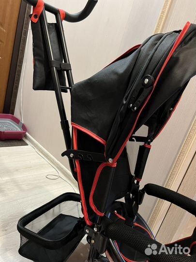 Трехколесный велосипед с ручкой