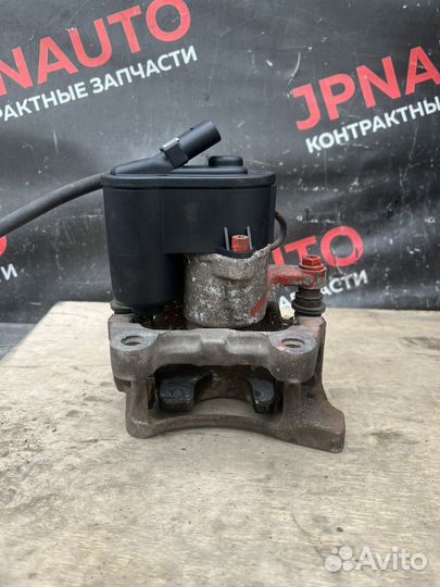 Суппорт задний левый Volkswagen Passat B6