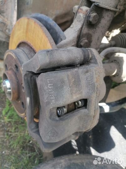 Суппорт тормозной передний правый Renault Logan