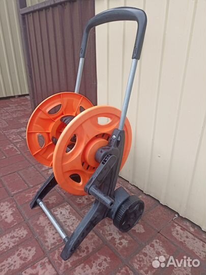 Катушка для поливочного шланга