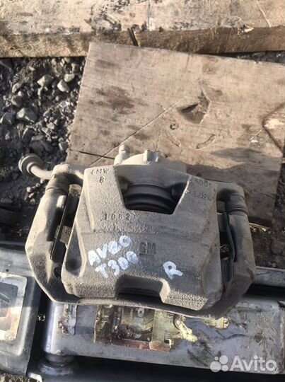 Суппорт правый Chevrolet Aveo t300