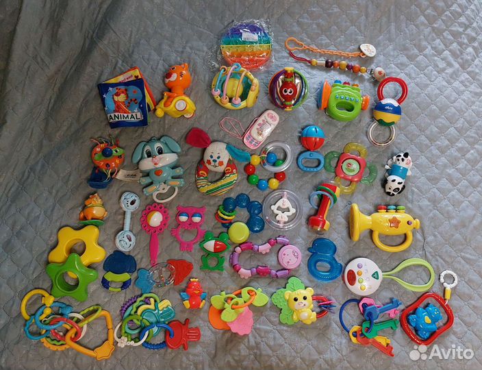 Погремушки для новорожденных