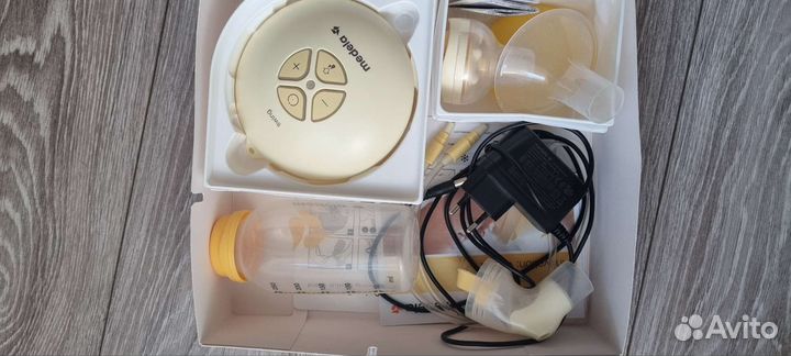 Молокоотсос medela swing электрический