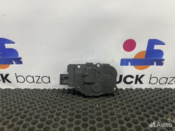 2056010 Моторчик заслонки отопителя