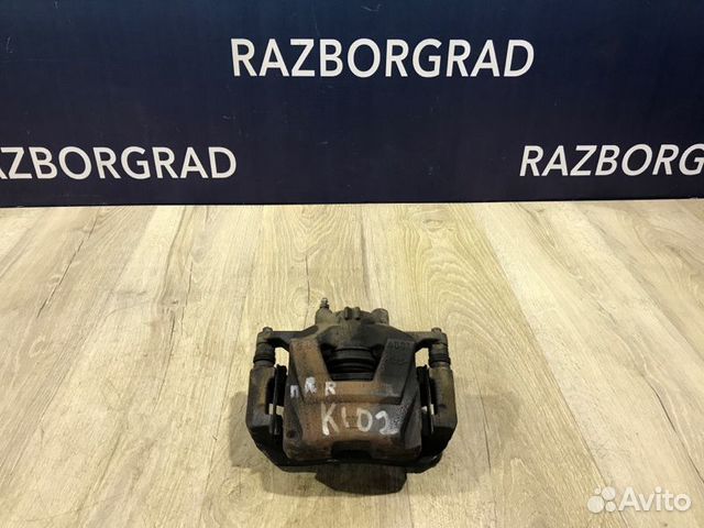 Суппорт передний правый Opel Astra J 1.4 A14NET