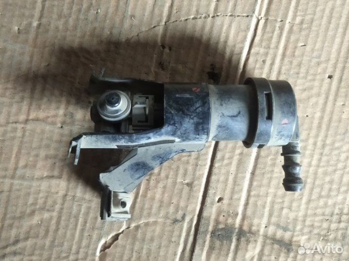 Форсунка омывателя фары передняя левая Nissan