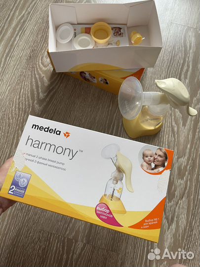 Молокоотсос medela новый