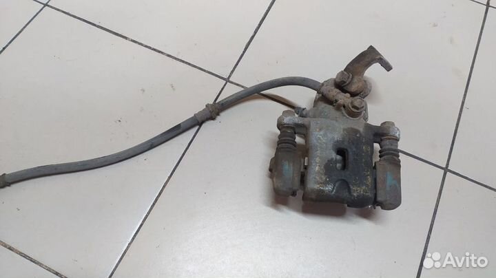 Суппорт задний правый Hyundai Elantra 3 (XD2)