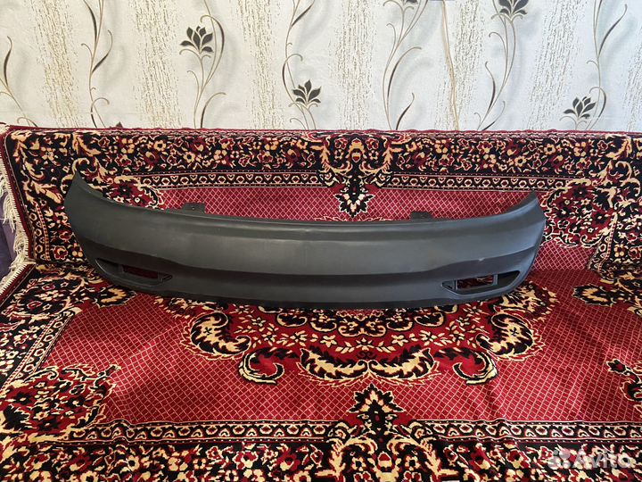 Бампер задний и нижний молдинг на бампер