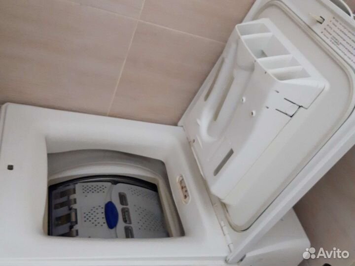 Стиральная машина с вертикальной загрузкой