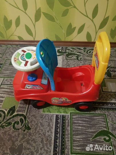 Развивающий автомобиль каталка