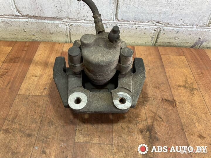 Суппорт тормозной задний левый BMW 7 F01/F02 F01