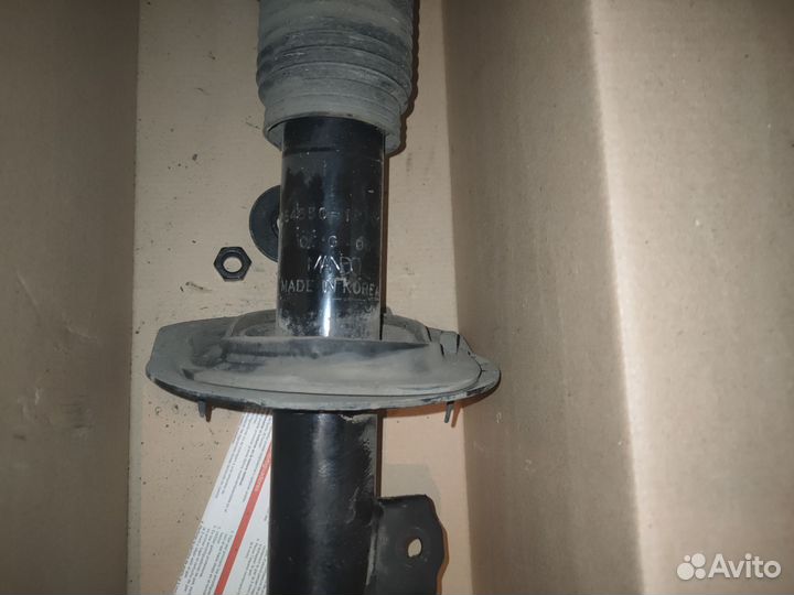 Амортизатор передний правый Kia Venga