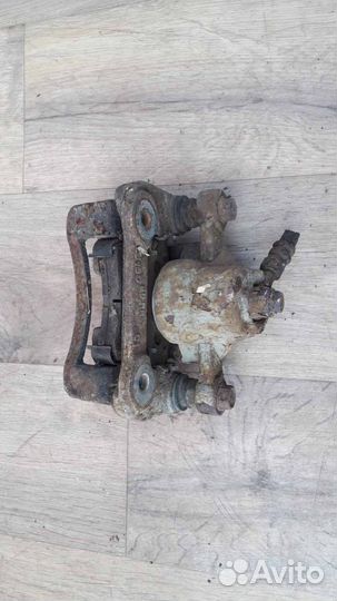 Суппорт задний левый KIA Ceed 1 2009