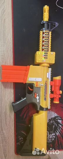 Игрушечная автоматическая винтовка