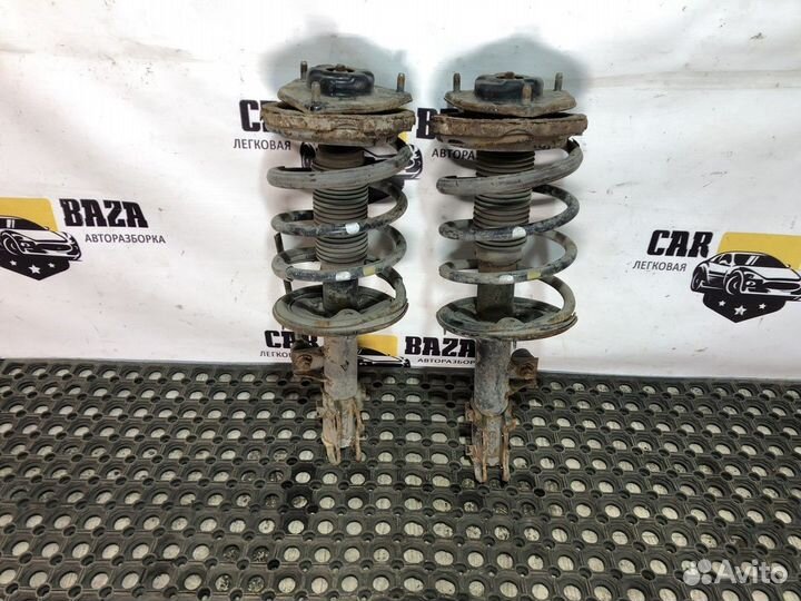 Стойки амортизаторов передние (комплект)
