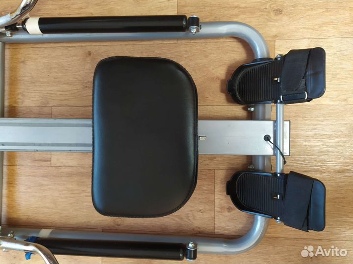 Гребной тренажер